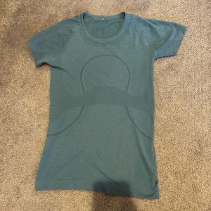 Blue lululemon athletic shirt in great condition fits size xs